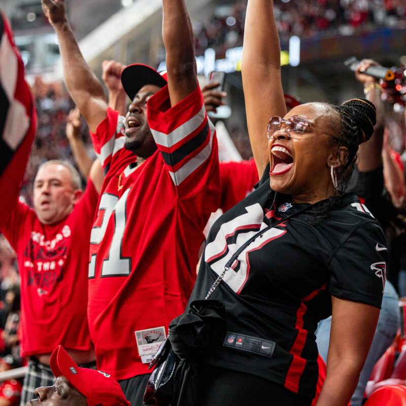 Atlanta sports fans enjoying a travel package in Fulton County, GA